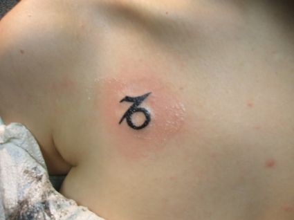 Capricorn Symbol Tattoo On Chest